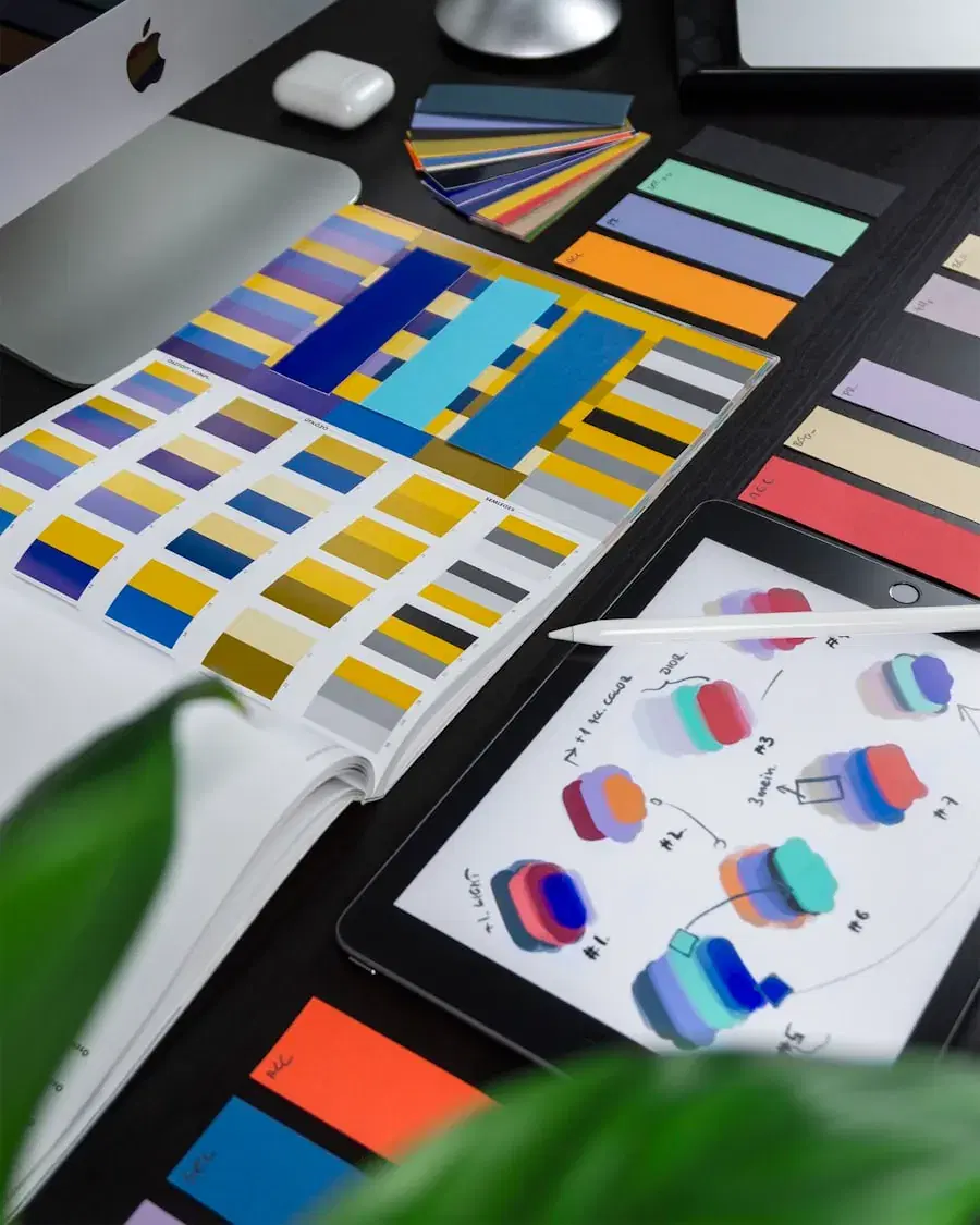 Colour swatches beside a tablet showing a design app